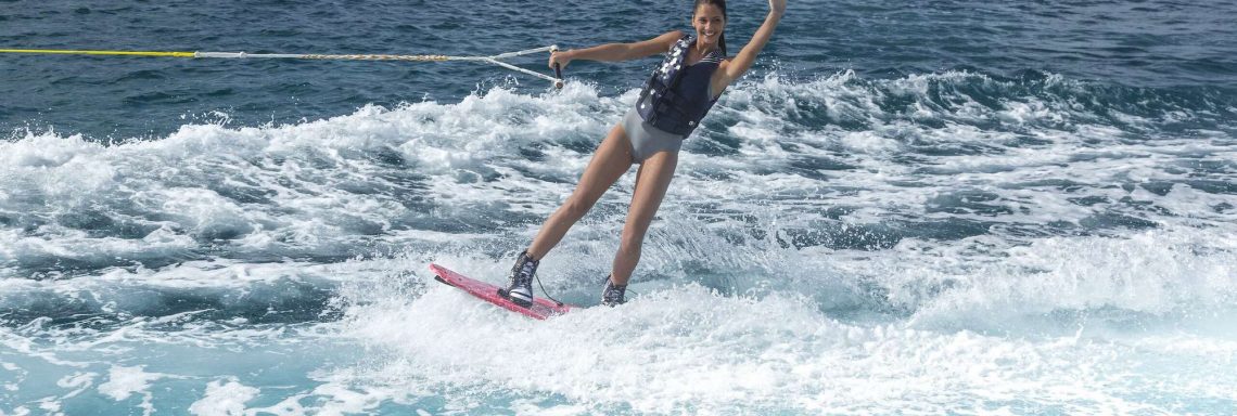 Club Med Kemer, Turkey - A young woman wakeboarding in the sea