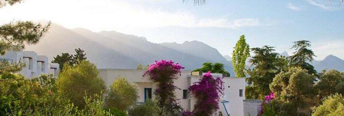 Club Med Kemer, Turkey - Image of several white bungalows in the mountains
