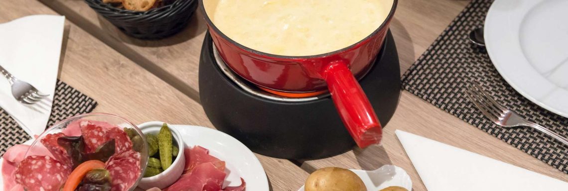 Club Med Arcs Extrême France Alps - Picture of a bowl of cheese fondue and cold meats