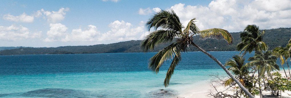 Club Med Miches Playa Esmeralda, Dominican Republic - Beach decor with ocean and mountain 