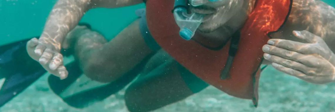 Club Med Columbus Isle, Bahamas - Man snorkelling in the sea