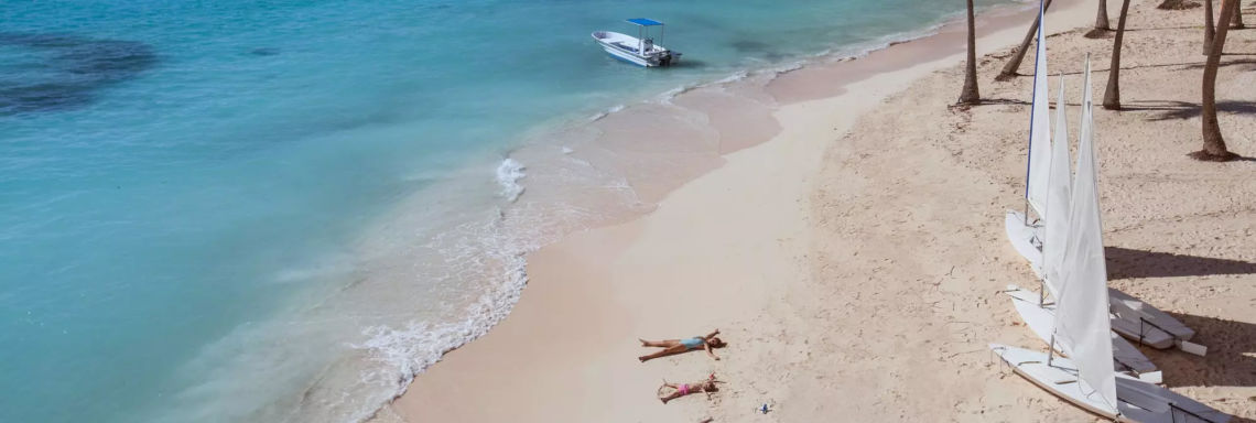 Club Med Punta Cana, Dominican Republic - People enjoying the sun lying on the beach