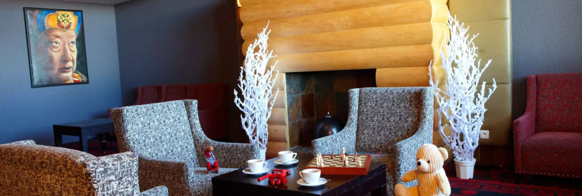 Club Med La Plagne 2100, France - Photo of a lounge with a tray of snacks and hot drinks