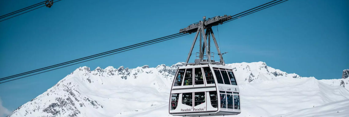 Club Med Peisey - Vallandry, France - Photo of Paradiski ski lift in action, full of skiers